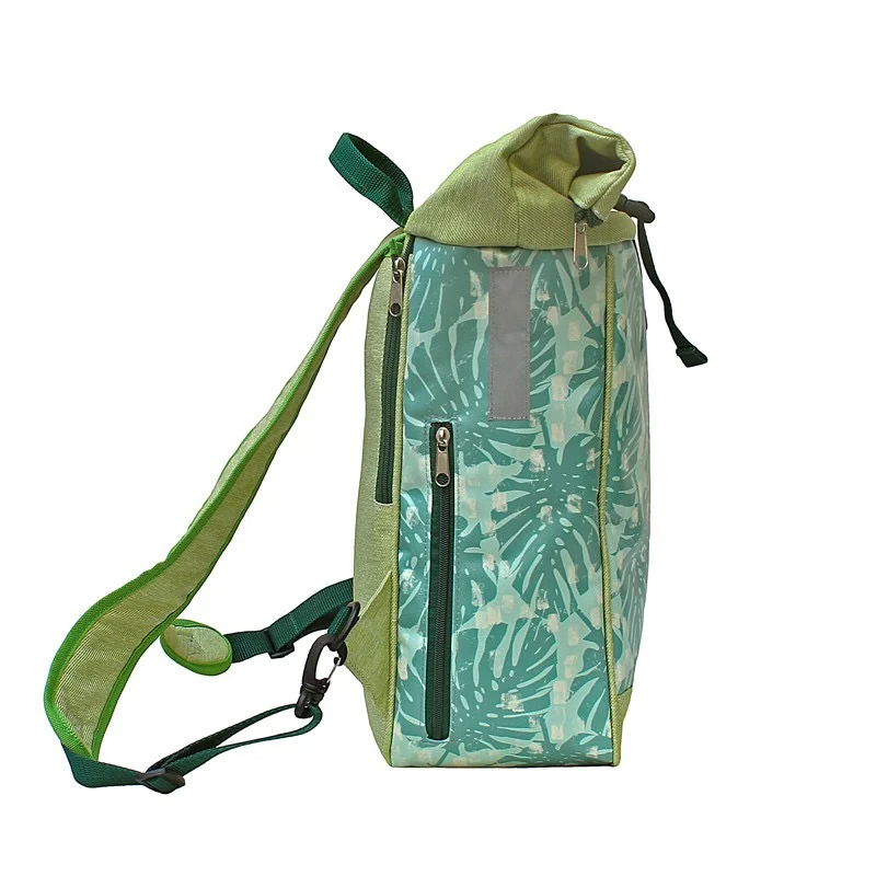 IKURI Kombi Fahrradtasche Rucksack Monstera – wasserdicht, 13–21 l, handgefertigt